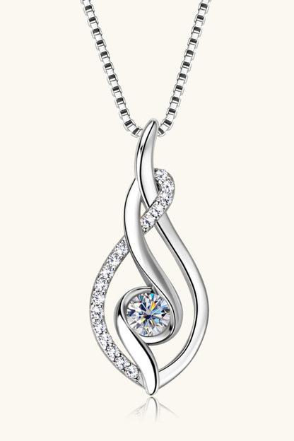 Silver necklace with a Swarovski crystal pendant on a white background
