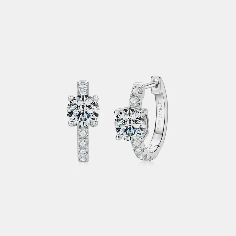 Diamond earring set on a light gray background