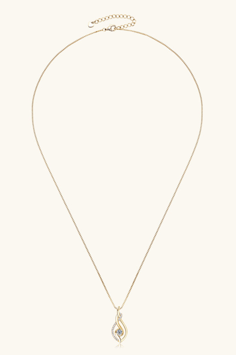 Gold necklace with a delicate pendant on a white background