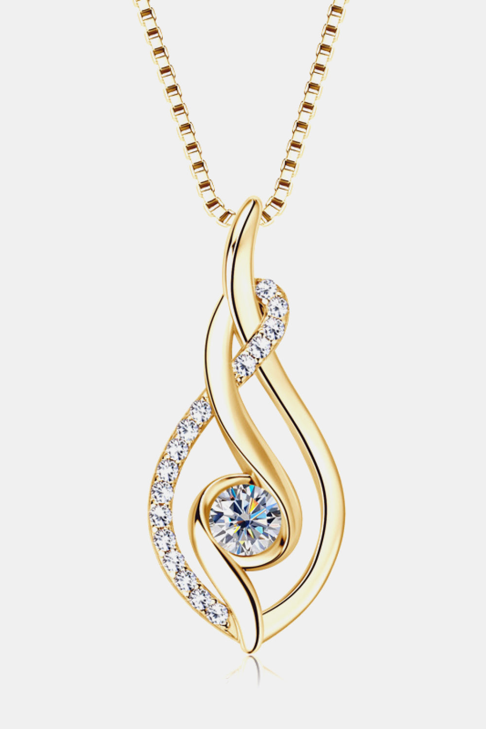 Gold necklace with a heart-shaped pendant on a white background