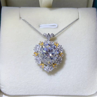Diamond necklace with heart-shaped pendant on a white cushion