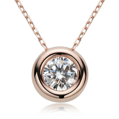Rose gold necklace with a round diamond pendant on a white background