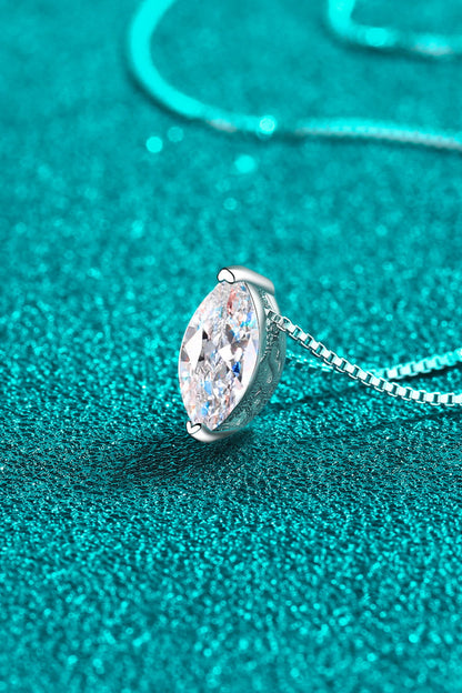 Diamond necklace on a teal textured background