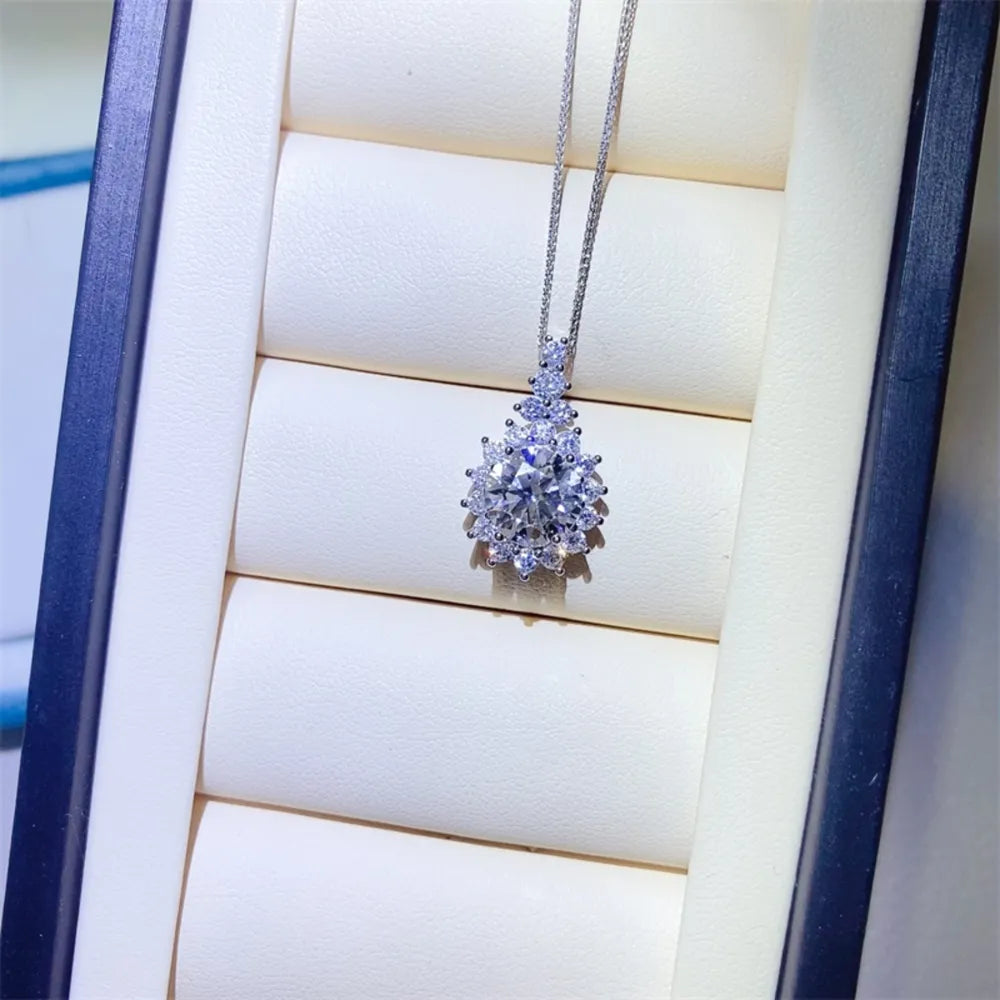 Diamond necklace on a white cushion with a blue border